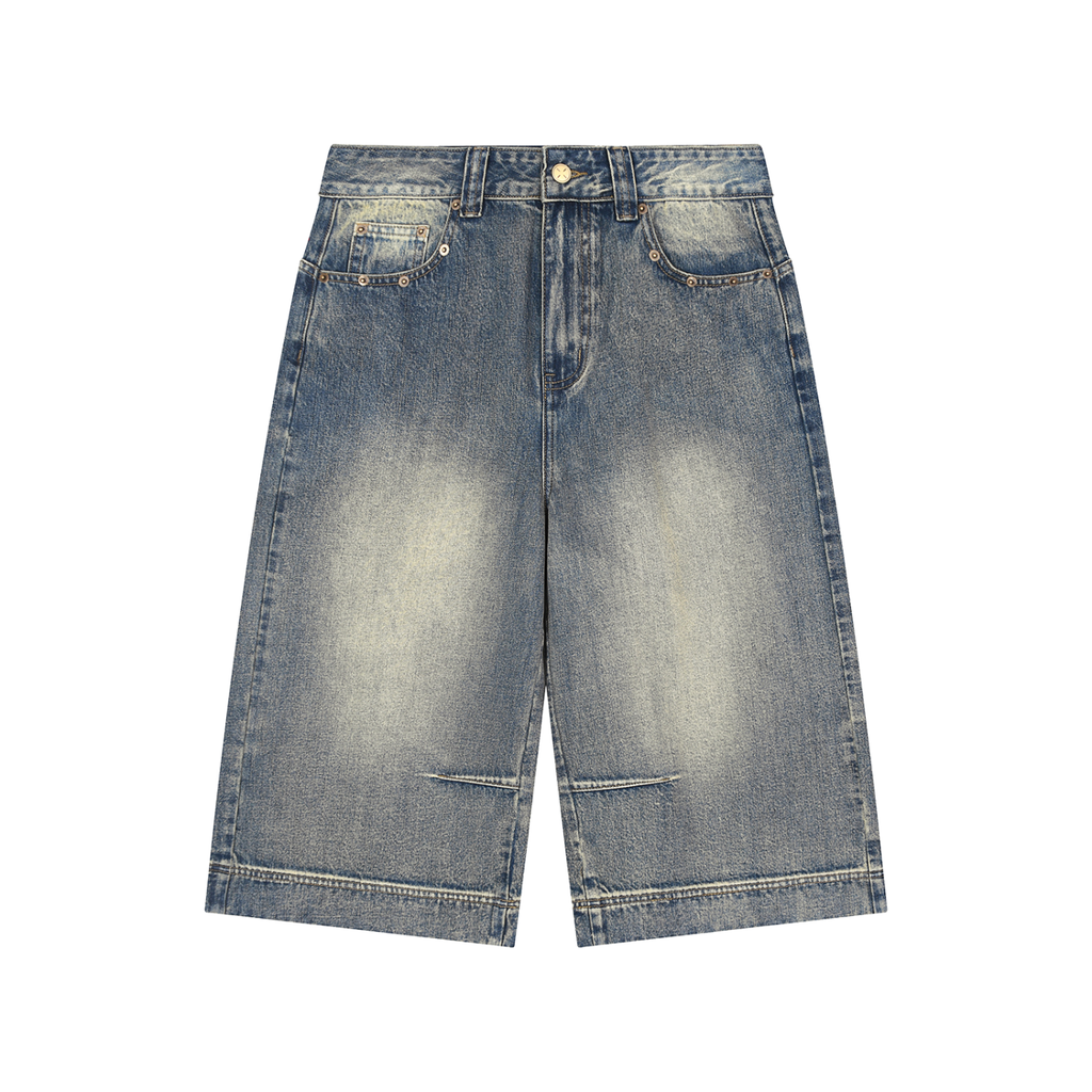Blue denim shorts on a white background