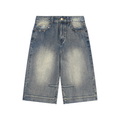 Blue denim shorts on a white background